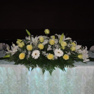 Wedding Arrangement With Yellow Roses, Lilacs & Daisies With Baby's Breath