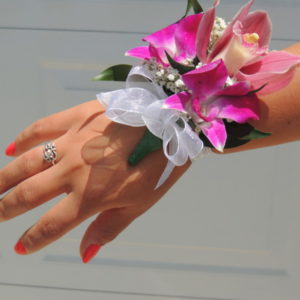 Orchid Corsage With White Ribbon