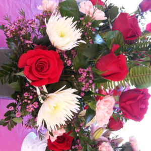 Red Roses, Pink Carnations & Assorted Flowers